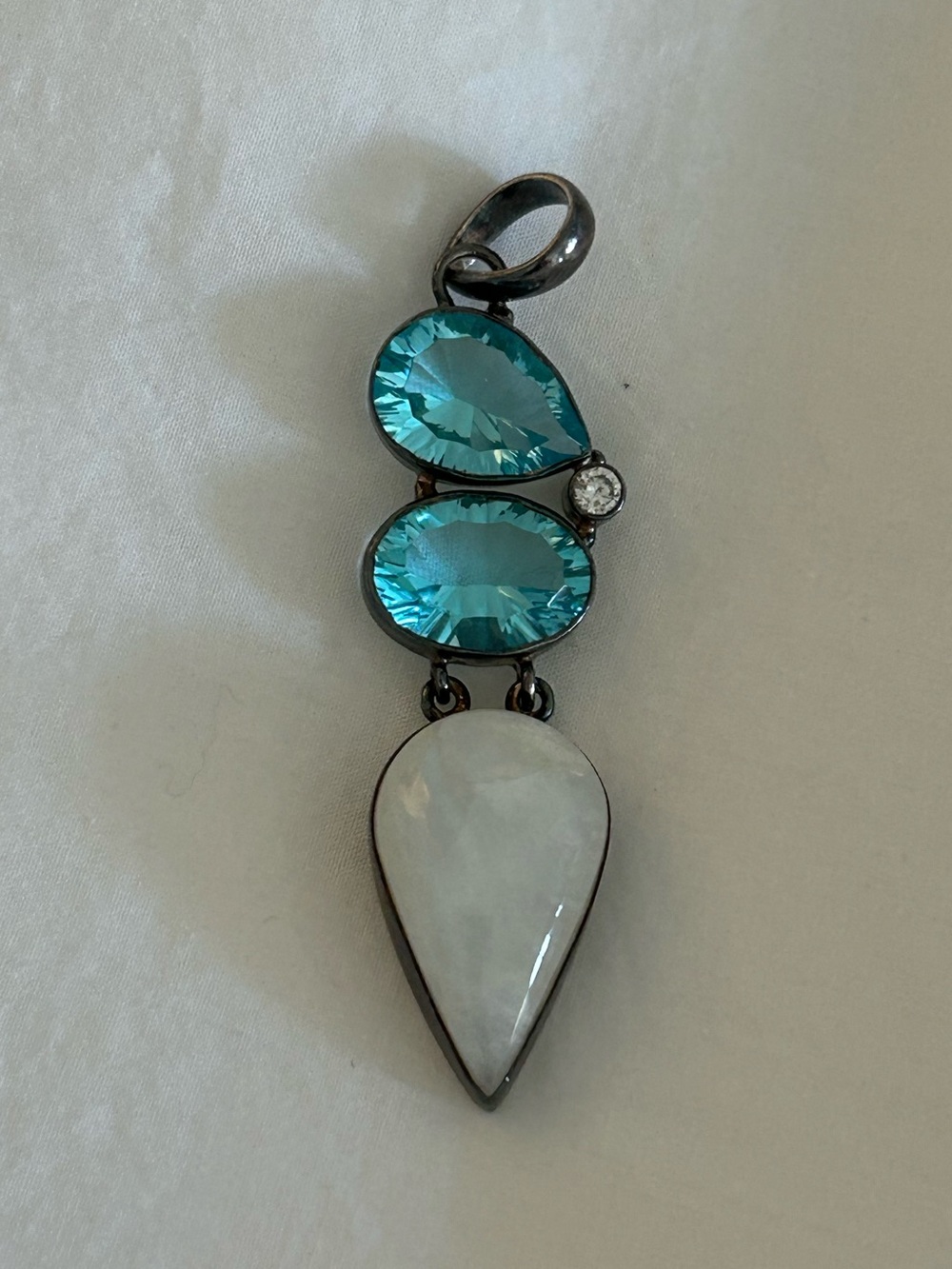 Turquoise and moonstone silver charm from Sedona